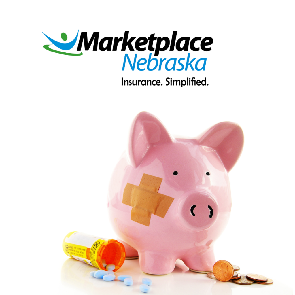 Piggy bank with bandaid next to prescription drugs under the Marketplace Nebraska logo